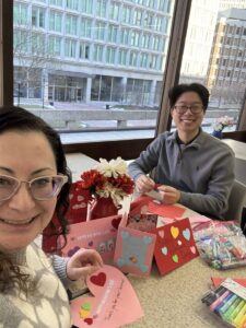 Two people sitting at table