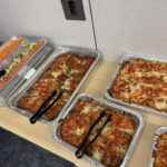 various foods pictured including salad and chicken