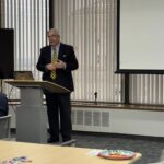 presenter speaking in front of the room